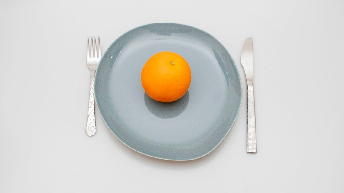 a few oranges on a plate